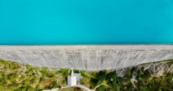 Arial view of a dam without any water flowing