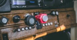 Red and black throttle knobs in an old car