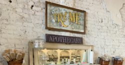 Vintage apothecary stand with the big sign TRY ME above