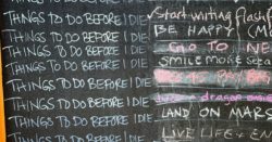 Long list of things to do before I die written by chalk on blackboard