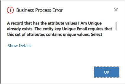 A screenshot of a sample error message with a caption "Business Process Error" and the message "A record that has the attribute values I Am Unique already exists. The entity key Unique Email requires that this set of attributes contains unique values. Select unique values and try again." 